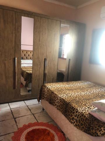 Comprar Casa / Padrão em Ribeirão Preto R$ 154.000,00 - Foto 2