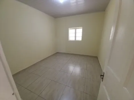 Alugar Casa / Padrão em Ribeirão Preto R$ 1.200,00 - Foto 1